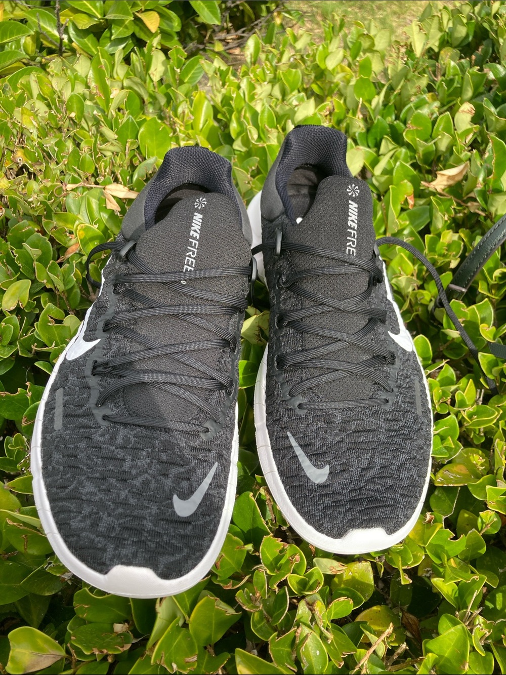 Nike Black and White Nike Free Athletic Running Shoe